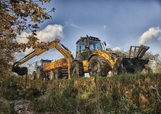 Багер-товарачи с обратно загребване New Holland B115C
