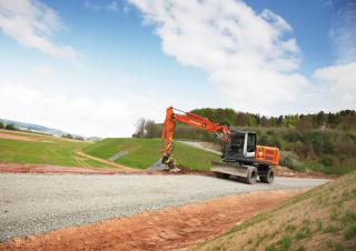 Колесни екскаватори Hitachi ZX 140 W 3