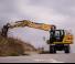 Колесни екскаватори Caterpillar M319