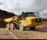 Съчленени самосвали Caterpillar 730