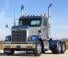 Freightliner 122SD 70 XT Mid Roof Cummins X15