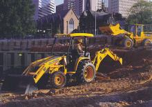 Багер-товарачи с обратно загребване John Deere Construction 110