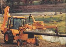 Багер-товарачи с обратно загребване John Deere Construction 210 C