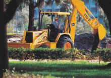Багер-товарачи с обратно загребване John Deere Construction 510 D