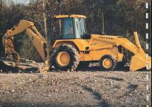 Багер-товарачи с обратно загребване John Deere Construction 610 C