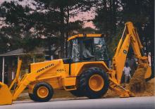 Багер-товарачи с обратно загребване John Deere Construction 710 B