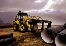 Багер-товарачи с обратно загребване New Holland B115B