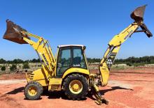 Багер-товарачи с обратно загребване Komatsu WB 140PS-2