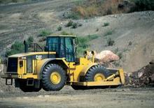 Колесна дозаторна машина Caterpillar 824 G II
