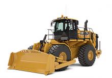 Колесна дозаторна машина Caterpillar 824K