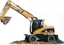 Колесни екскаватори Caterpillar M 313 C Mono