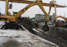 Колесни екскаватори Caterpillar M 318 C MH