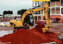 Колесни екскаватори Caterpillar M313D
