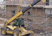 Телескопични манипулатори на материали Caterpillar TH 63