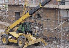 Телескопични манипулатори на материали Caterpillar TH 83