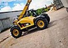 Телескопични манипулатори на материали Caterpillar TH406