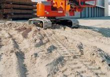 Пълзящи повдигачи с подвижна стрела Hitachi HX 64 B