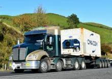 Влекачи Kenworth T410 760mm Mid roof MX13 8x4